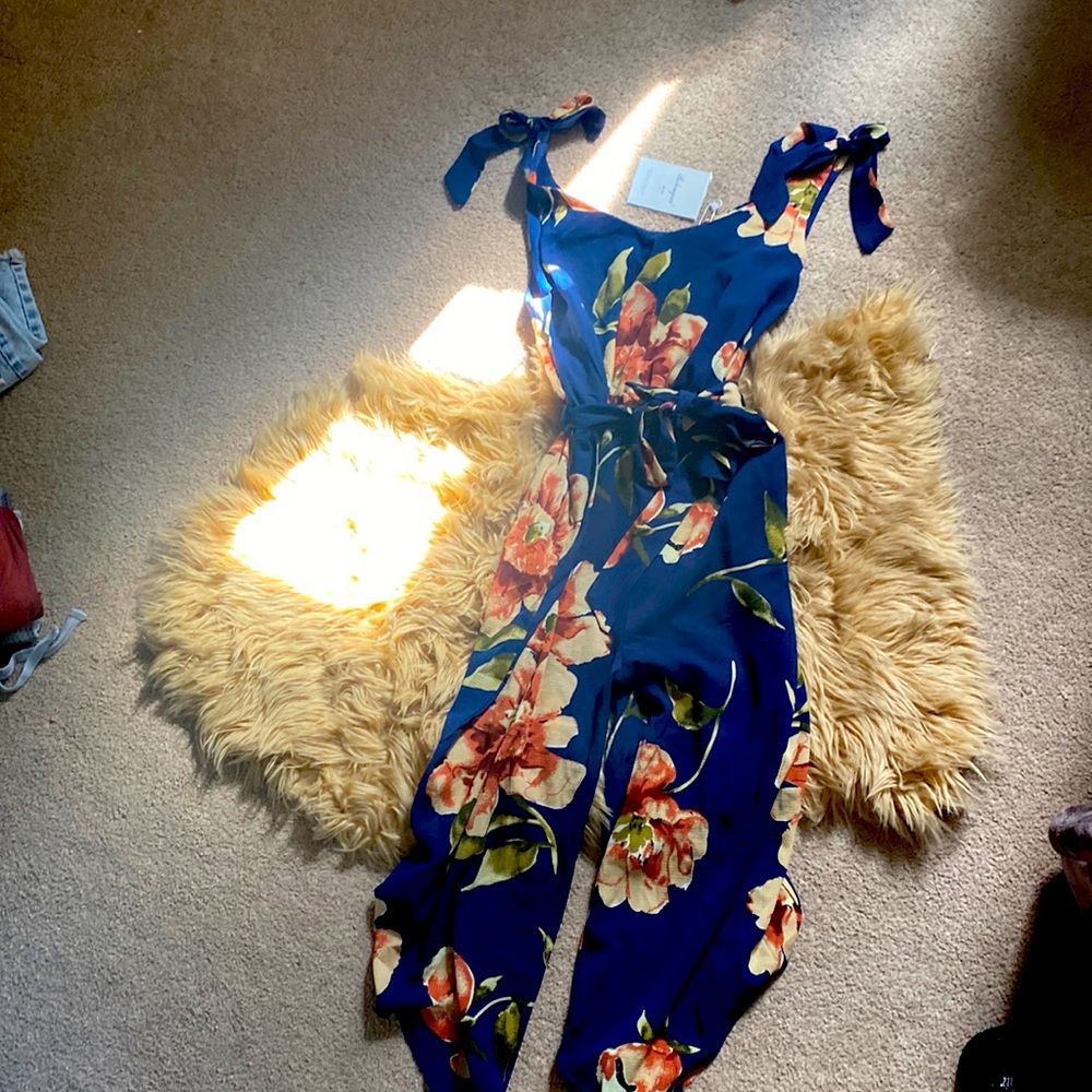 Romper with pockets . Brand new with tags